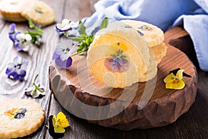 Homemade shortbread cookies with edible flowers