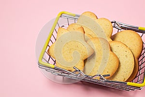 Homemade shortbread cookies on a pink background. Delicious and light dessert.