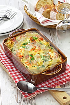 Homemade shrimp macaroni cheese gratin, casserole dish