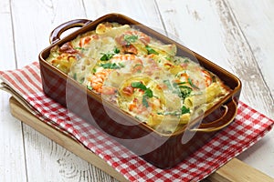 Homemade shrimp macaroni cheese gratin, casserole dish