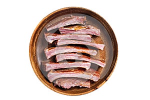 Homemade Smoked Barbecue Pork Ribs in wooden plate ready for eat. Isolated on white background.