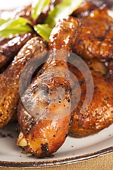 Homemade smoked chicken drumstick on a plate