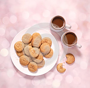 Homemade snickerdoodle cookies and two cups of coffee