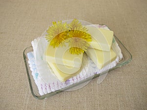 Homemade solid body butter bars with dandelion flower oil