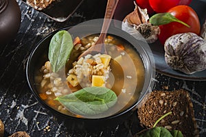 Homemade soup- dark photo. Background food- still life nosh. Serving meals in the home kitchen. Cook meals for the family