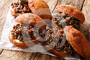 Homemade South African Vetkoek deep-fried buns stuffed with minced meat close-up. horizontal
