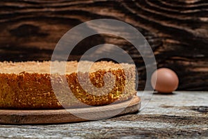 Homemade sponge cake or chiffon cake with ingredients on wooden table. Bakery background concept. banner, menu recipe place for