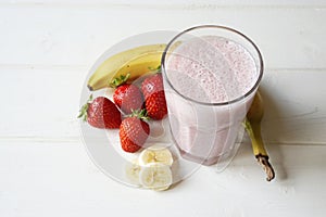 Homemade strawberry and banana milkshake smoothie