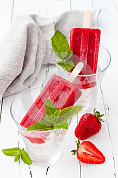 Homemade strawberry mint - ice pops - popsicles - paletas. photo