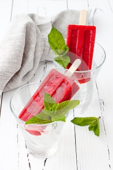 Homemade strawberry mint - ice pops - popsicles - paletas. photo