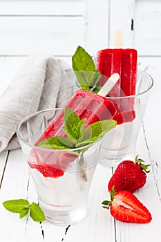 Homemade strawberry mint - ice pops - popsicles - paletas. photo