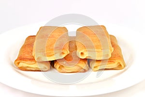 Homemade stuffed pancakes, wrapped with an envelope