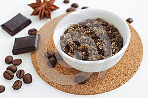 Homemade sugar, olive oil and ground coffee face and body scrub. Diy cosmetics.