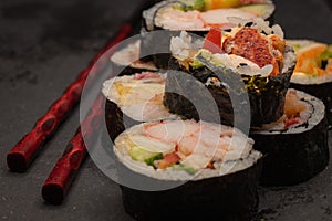 Homemade sushi maki with fresh seafood