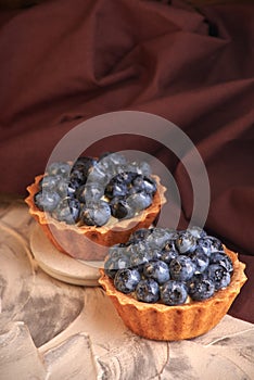 homemade sweet cakes with blueberry berries. delicious home baking