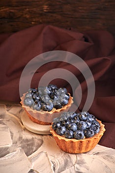 homemade sweet cakes with blueberry berries. delicious home baking