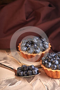 homemade sweet cakes with blueberry berries. delicious home baking