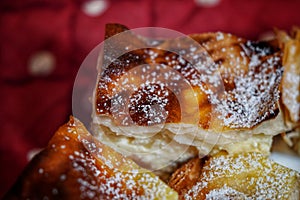 Homemade sweet cheese pie powedered with sugar