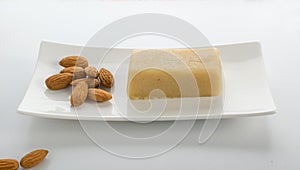 Homemade sweet marzipan bread on white background photo