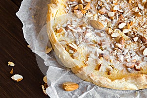 Homemade sweet tart with almonds photo