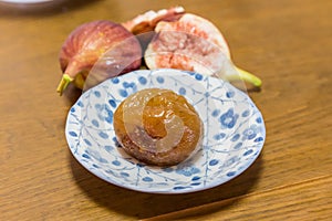 Homemade sweeten preserved fig and fresh figs.