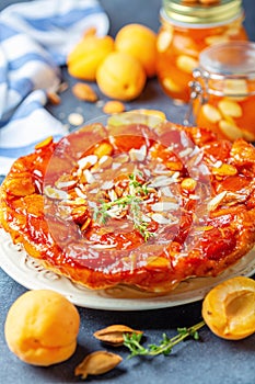 Homemade tarte tatin pie with apricots and thyme