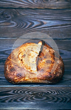 Homemade tartine bread on dark wooden table
