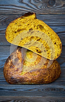 Homemade tartine bread on dark wooden table