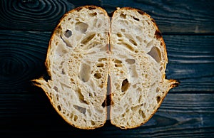 Homemade tartine bread on dark wooden table