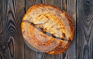 Homemade tartine bread on dark wooden table