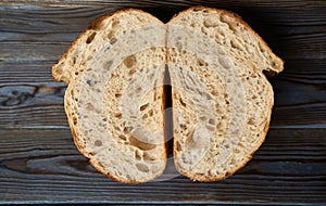 Homemade tartine bread on dark wooden table