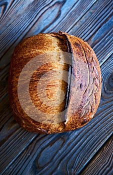 Homemade tartine bread on dark wooden table