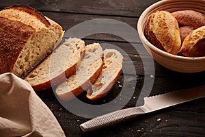 Homemade tartine bread on dark wooden table