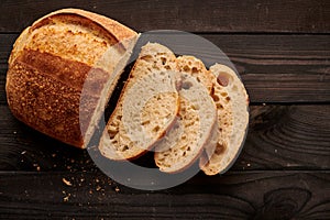 Homemade tartine bread on dark wooden table