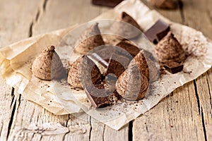 Homemade Tasty Chocolate Truffle Candy on the Old Wooden Background Tasty Candy