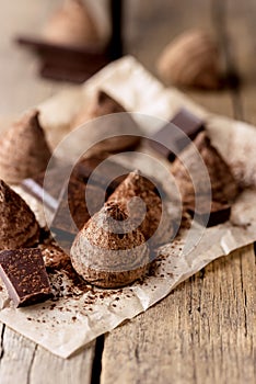 Homemade Tasty Chocolate Truffle Candy on the Old Wooden Background Tasty Candy Dessert Vertical
