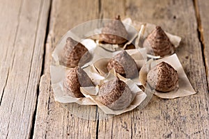 Homemade Tasty Chocolate Truffle Candy on the Old Wooden Background tasty Dessert Copy Space