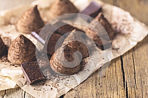 Homemade Tasty Chocolate Truffle Candy on the Old Wooden Background Tasty Dessert Horizontal Toned