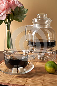 Homemade tea party. Hot tea in a transparent cup