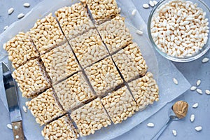 Homemade three ingredients bars with crispy rice, honey and peanut butter, horizontal, top view