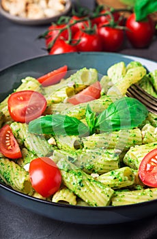 Homemade tortiglioni pasta with vegan pesto sauce