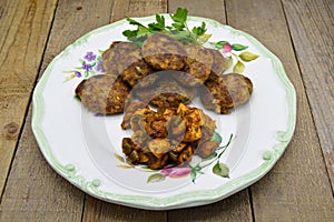 Homemade Turkish meatballs kofte or kofta and saute the mushrooms