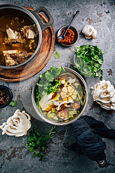 Homemade vegetable broth with beef bone broth with ingredients