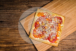 Homemade warm baked tomato pizza