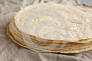 Homemade Wheat Flour Tortillas in a Stack, side view. Close-up