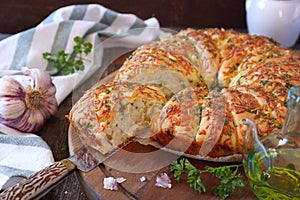 Homemade white bread with garlic and grated cheese