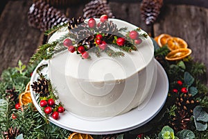 Homemade white cream naked cake decorated with white cream, cone