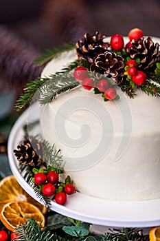 Homemade white cream naked cake decorated with white cream, cone