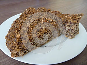 Homemade wholegrain bread on a white plate