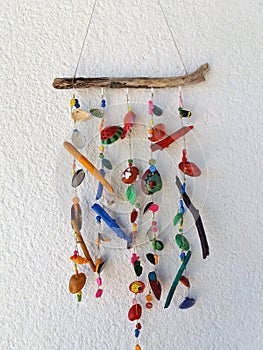 Homemade Wind Chimes from seashells with lovely colorfull touch of children